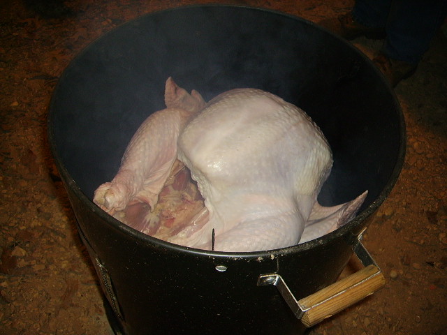 Turkey on grill in smoker